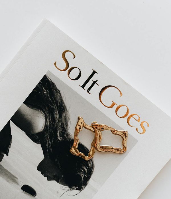 Magazine-style editorial cover portrait showcasing modern construction